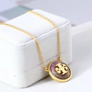 Tory Burch Elegant Gold Pendant Necklace